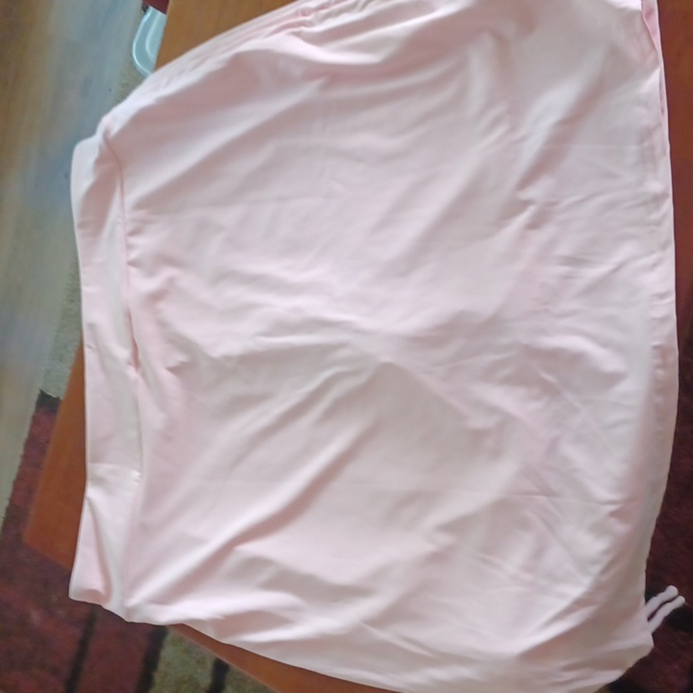 Cakula pink skirt new size 2XL with adjustable straps  on the sides.